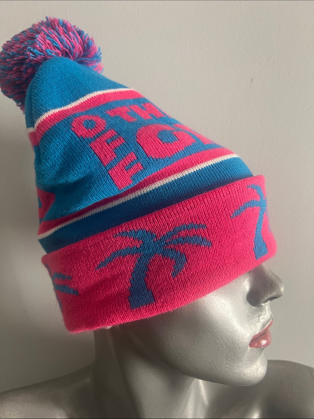 crown & ivy blue and pink palm tree pom beanie